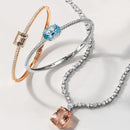 Pulseira Reali banhado Ouro Branco com Topázio Sky e Zircônio